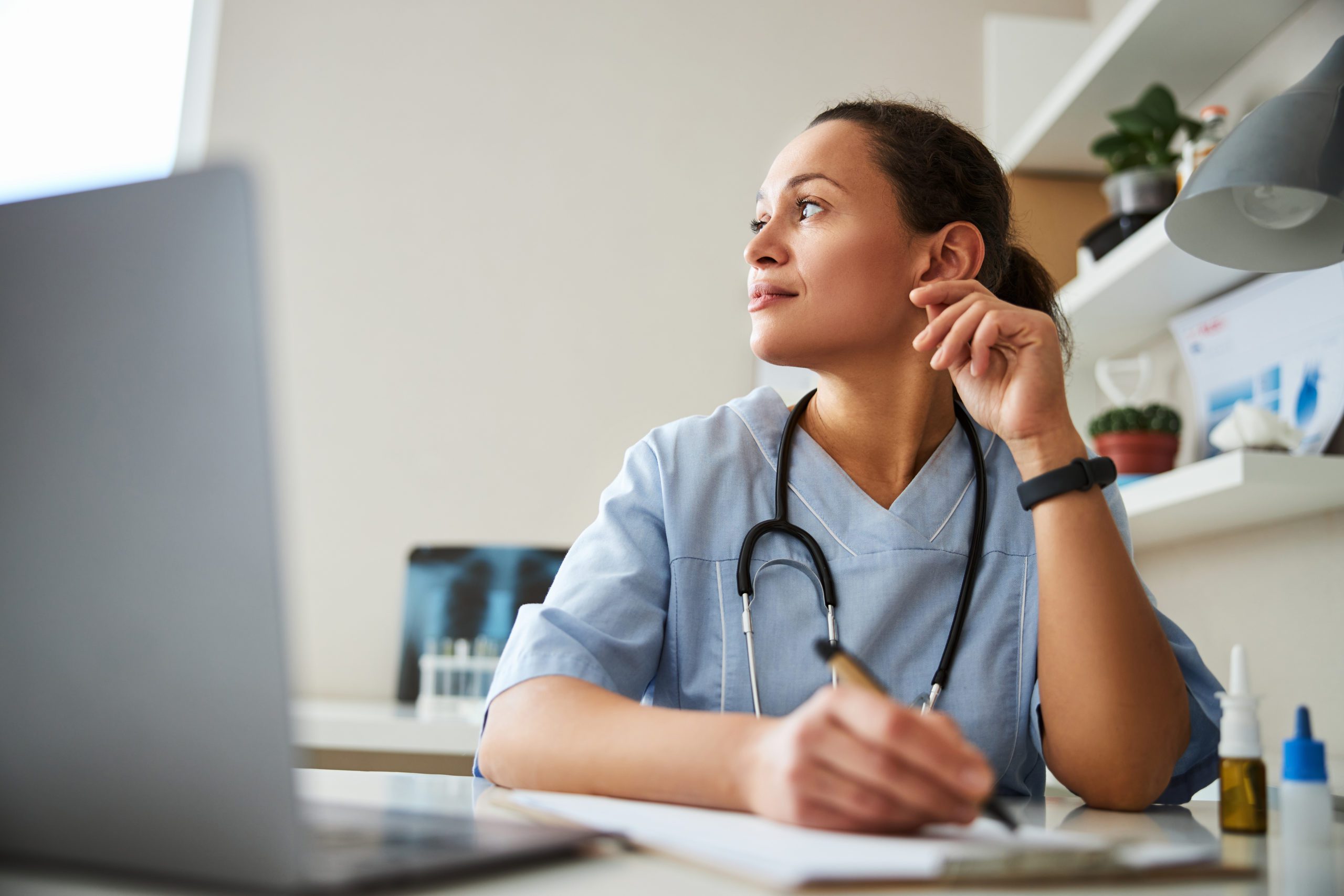 bigstock-Dreaming-Medic-Rubbing-Her-Ear-404177432-scaled (2)